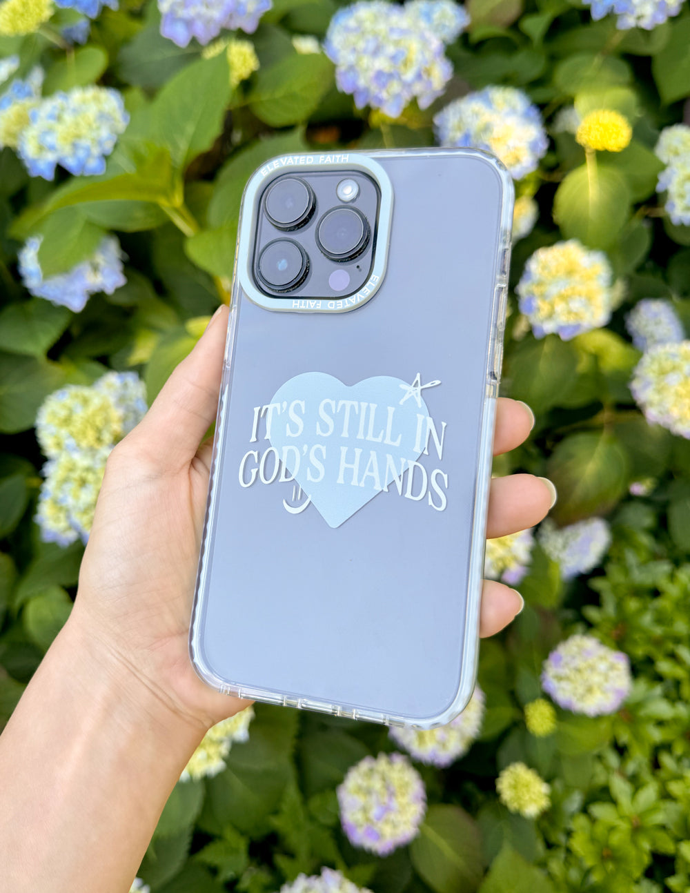 Elevated Faith In God's Hands Phone Case iPhone 14