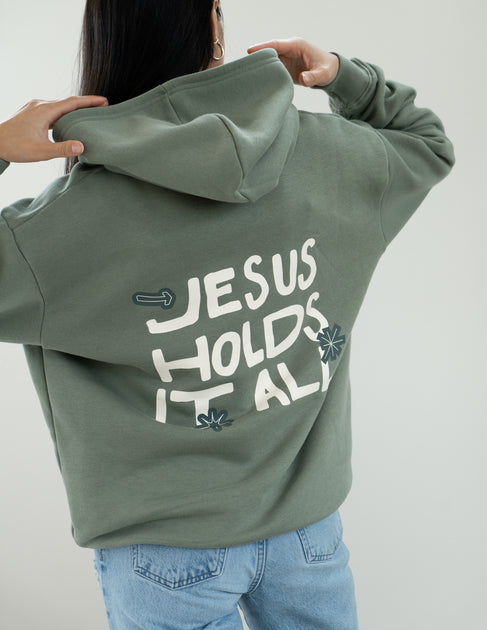 Jesus Holds It All Hoodie | Christian Hoodies | Elevated Faith