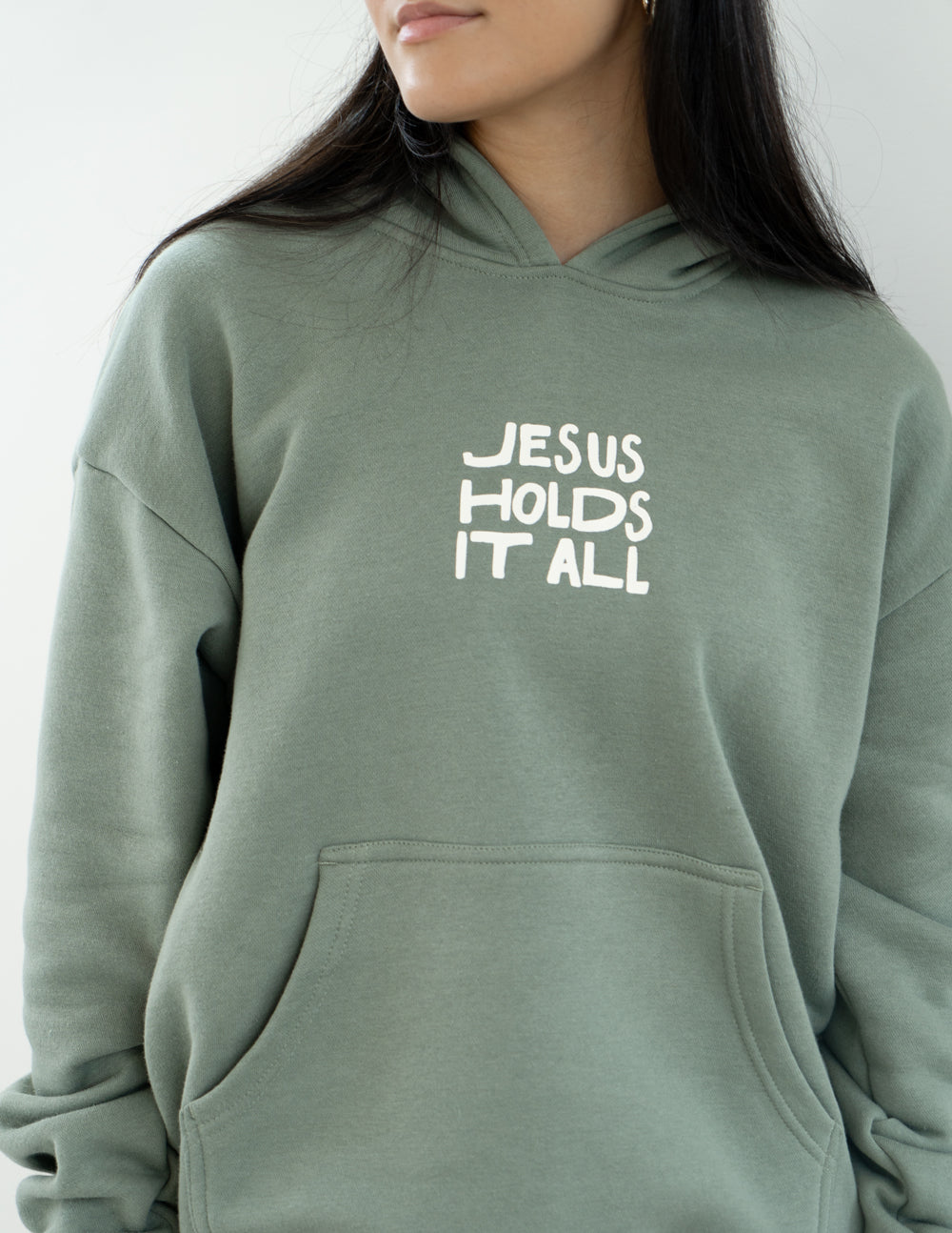 Jesus Holds It All Hoodie | Christian Hoodies | Elevated Faith