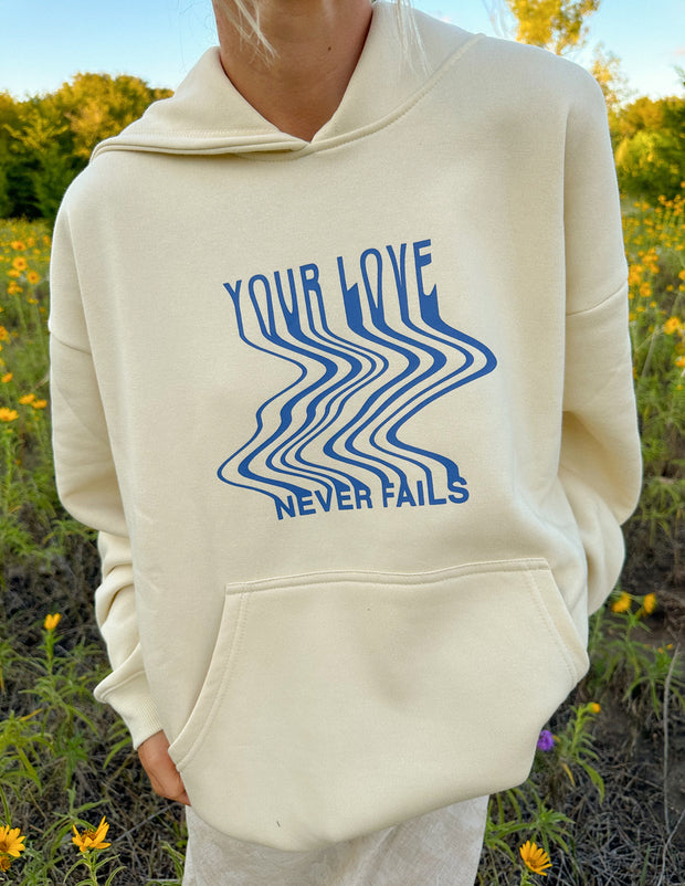 Love Never Fails Christian Hoodie - Fabrics Of Faith
