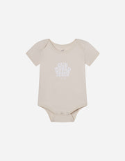 Our World Needs Jesus Beige Onesie Christian Baby Clothing