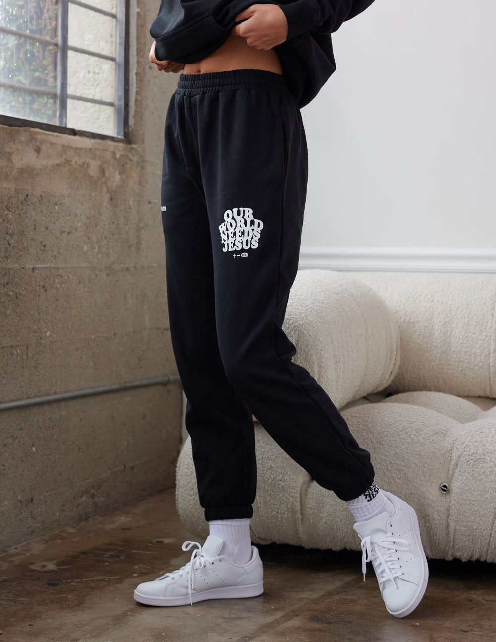 Our World Needs Jesus Black Unisex Sweatpant | Elevated Faith